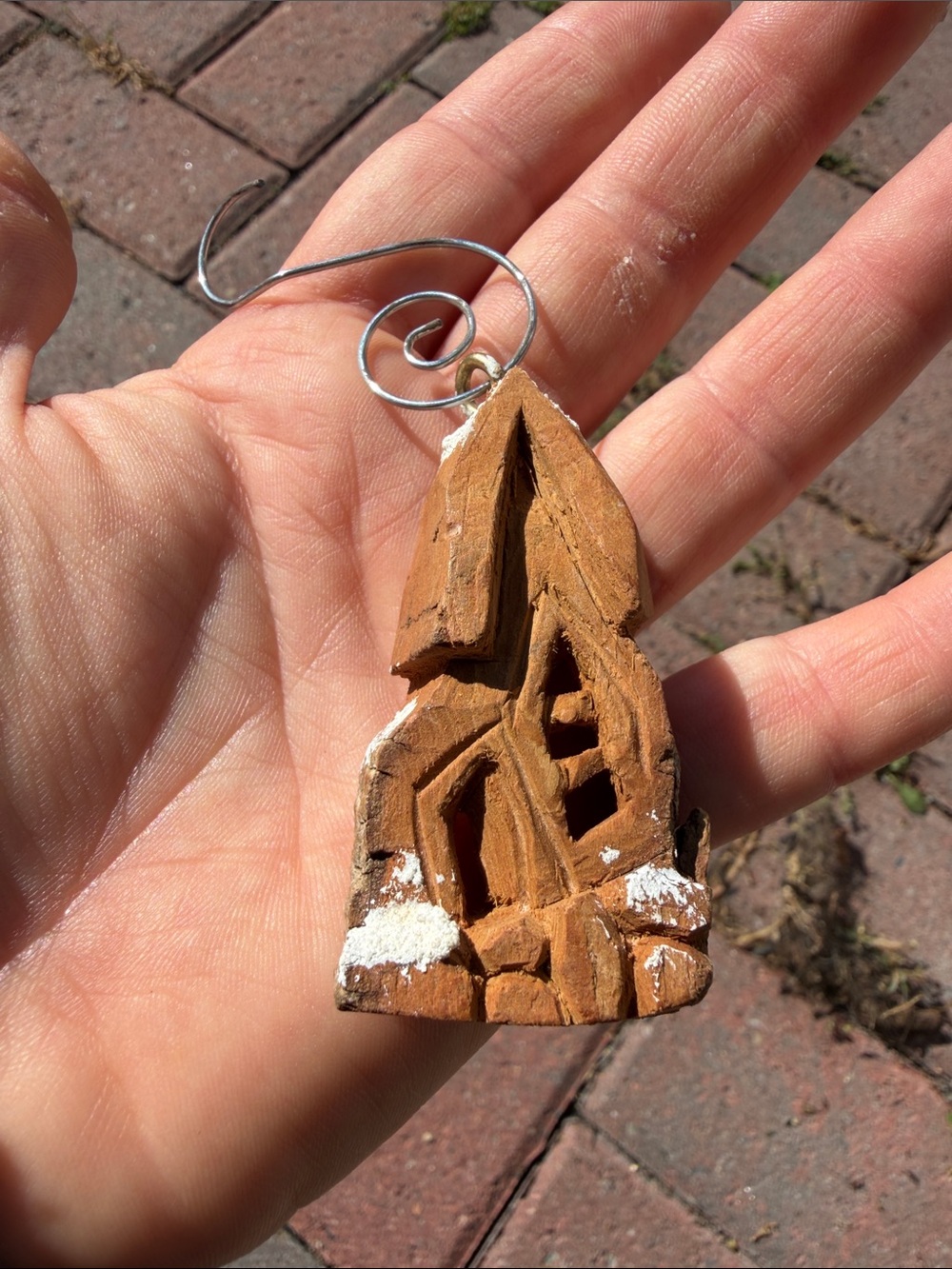 Hand-Carved Brown Wooden House Ornament with Metal Hook